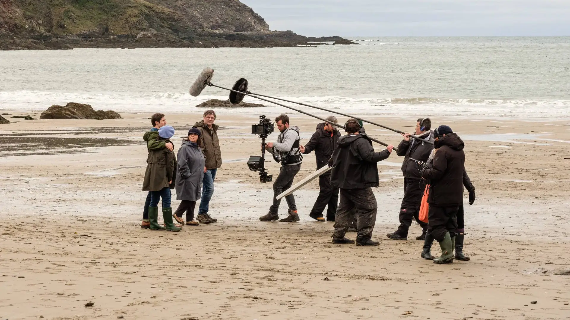 A film crew shooting on a Cornwall beach